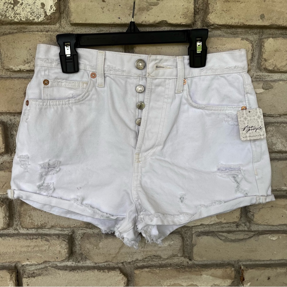 Free people White lasso short distressed shorts by (we the free) button closure